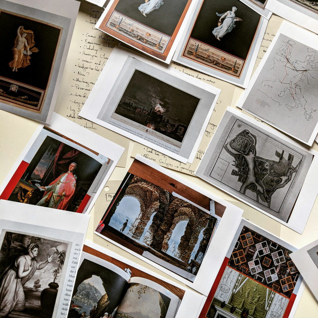 Illustrations of the Worlitz park maps and paintings are cut out and laid on top of handwritten script notes.